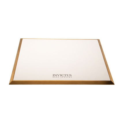Invictus Satin Brass Frame on White Leatherette with Empty Display Base